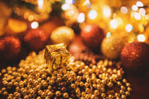 Celebrate Christmas With Glitter And Gold Wallpaper