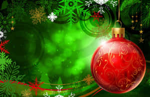 Celebrate Christmas With The Joyful Colors Of Red And Green. Wallpaper