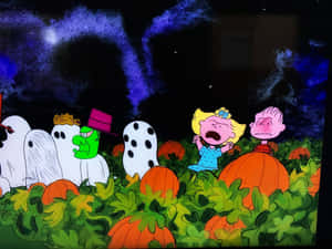 Celebrate Halloween With The Peanuts Gang Wallpaper