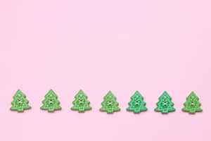 Celebrate The Holidays With A Festive Pink Christmas Tree Wallpaper