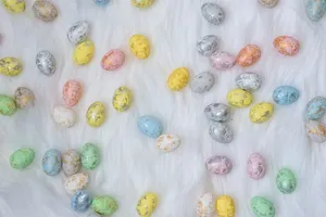 Celebrate The Joy Of Easter With Colorful Tiny Assorted Easter Eggs Wallpaper