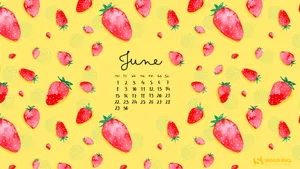 Celebrate The Month Of June With Tasty Strawberries. Wallpaper
