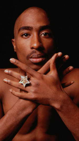 Celebrating The Life And Legacy Of Legendary Artist Tupac Shakur Wallpaper