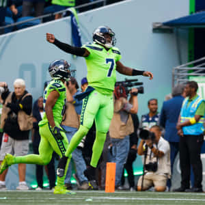 Celebratory Football Player Number7 Wallpaper