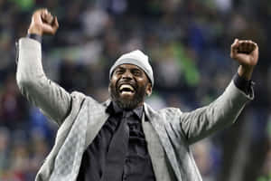 Celebratory Momentat Stadium Randy Moss Wallpaper