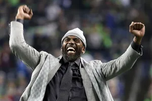 Celebratory Momentat Stadium Randy Moss Wallpaper