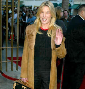 Celebrity Wavingat Event Wallpaper