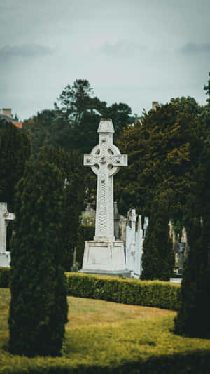 Celtic Cross In Cemetery Wallpaper