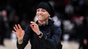 Central Cee Smiling At Event Wallpaper