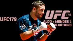 Chad Mendes In Intense Ufc 179 Fight Action Wallpaper