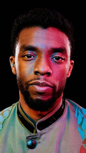 Chadwick Boseman Illuminated Red Light Wallpaper