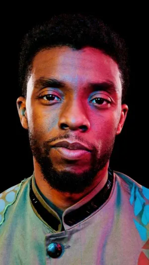 Chadwick Boseman Illuminated Red Light Wallpaper
