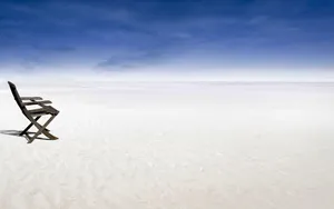 Chair On Quiet Snowy Plain Wallpaper