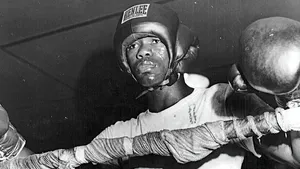 Champion Boxer Ike Williams In Training Gear Wallpaper