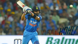 Champions Attitude - Virat Kohli In Action Wallpaper