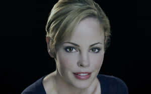 Chandra West Smiling Radiantly In A Stunning Photoshoot Wallpaper