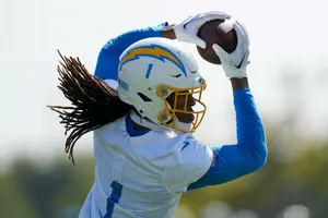 Chargers Player Catching Football Wallpaper
