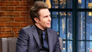 Charismatic Sam Rockwell On Late Night With Seth Meyers Wallpaper