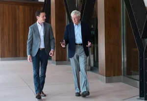 Charles G. Koch Walking Outside Wallpaper