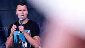 Charlie Kirk Speaking At Event Wallpaper