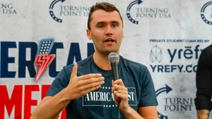 Charlie Kirk Speaking At Event Wallpaper