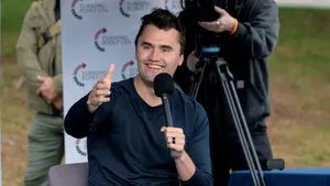 Charlie Kirk Speaking At Event Wallpaper
