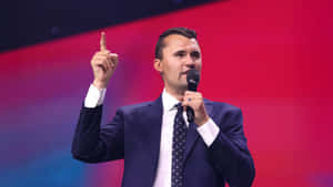 Charlie Kirk Speaking At Event Wallpaper