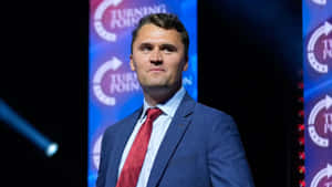 Charlie Kirk Speaking At Turning Point Wallpaper