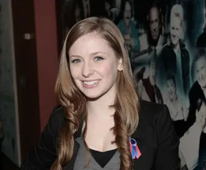 Charlotte Arnold Smilingat Event Wallpaper