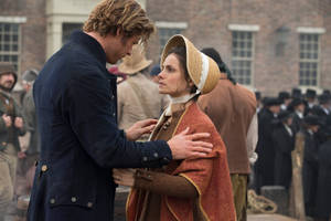 Charlotte Riley Scene With Chris Hemsworth Wallpaper