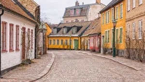 Charming Cobbled Street Lund Sweden Wallpaper