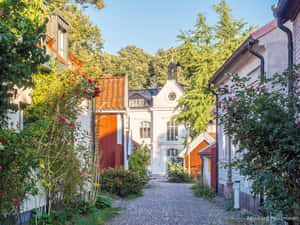 Charming Cobblestone Street Kalmar Sweden Wallpaper