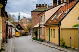 Charming Cobblestone Street Lund Sweden Wallpaper