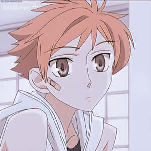 Charming Kaoru Hitachiin Smiling In A Close-up Shot Wallpaper