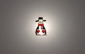 Charming Penguin Tux In Its Natural Habitat Wallpaper