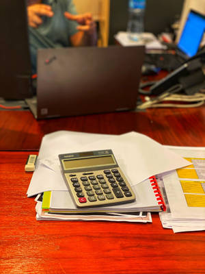 Chartered Accountant Red Desk Wallpaper