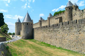 Chateau Comtal Rampart In Carcassonne Wallpaper