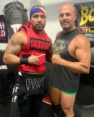 Chavo Guerrero With His Uncle Eddie Guerrero Wallpaper