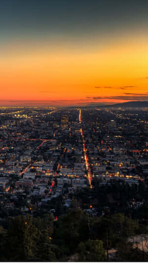 Check Out The Amazing Skyline Of Los Angeles, California. Wallpaper