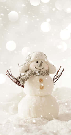 Cheerful_ Snowman_in_ Snowfall.jpg Wallpaper