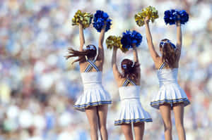 Cheerleaders Performingat Sporting Event.jpg Wallpaper