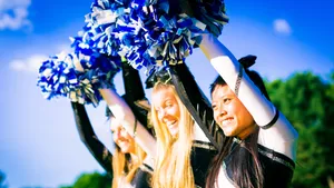 Cheerleadersin Action Wallpaper