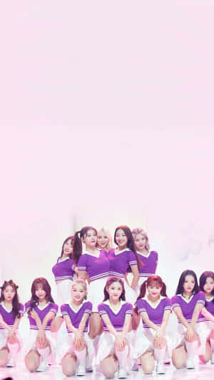 Cheerleading Team_ Purple Uniforms_ Pink Background Wallpaper