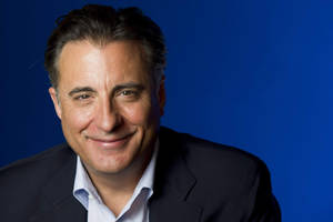 Cheery Actor Headshot Of Andy Garcia Wallpaper