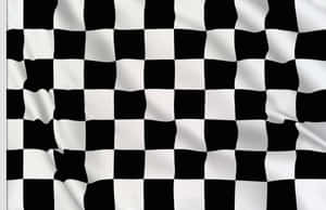 Chequered Flag Waving In The Wind On A Race Track Wallpaper
