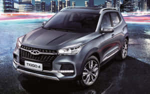 Chery Compact Suv On A Nature Drive= Wallpaper