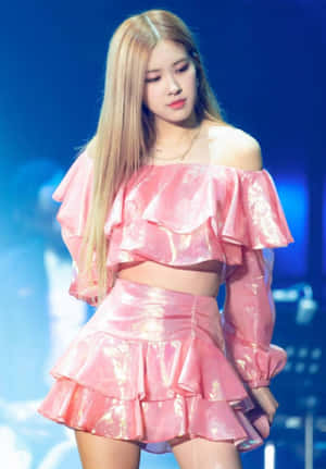 Chic Woman In A Stylish Pink Outfit Wallpaper