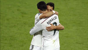 Chicharito Celebratingwith Teammate Wallpaper