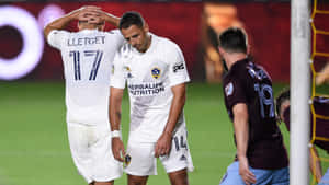 Chicharito Consoledby Teammate After Miss Wallpaper