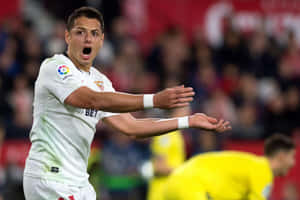 Chicharito In Action Sevilla F C Wallpaper